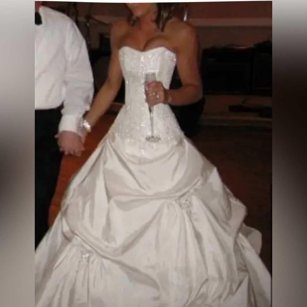 Maggie Sottero Victoriana wedding gown.